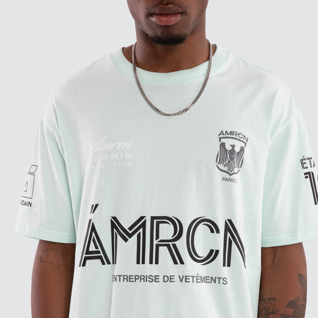 Model wears Crest Loopback Oversized Tee Placid Blue T-Shirts Blue – image 1