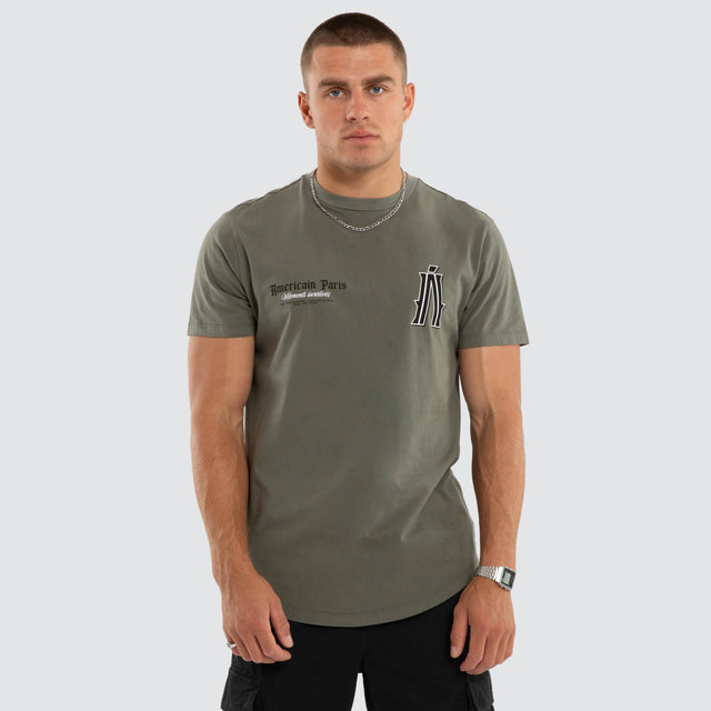 Model wears Pressure Dual Curved Tee Basil T-Shirts Green – image 3