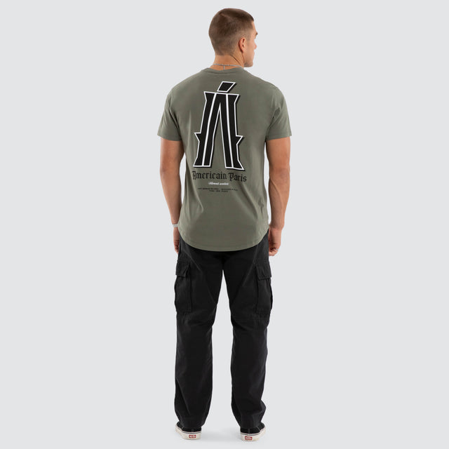 Model wears Pressure Dual Curved Tee Basil T-Shirts Green – image 5