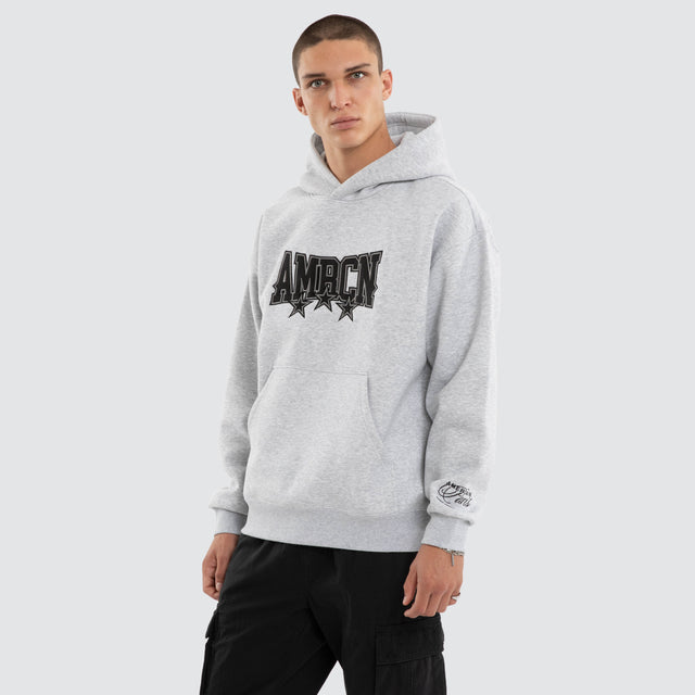 Model wears Tri-Star Relaxed Hoodie Grey Marle Hoodies Grey – image 3