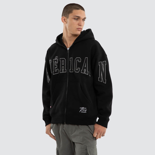 Model wears Armour Relaxed Zip Hoodie Jet Black Hoodies Black – image 3