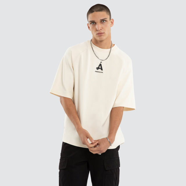 Model wears Glide Raglan Raptor Tee Tofu T-Shirts Cream – image 1