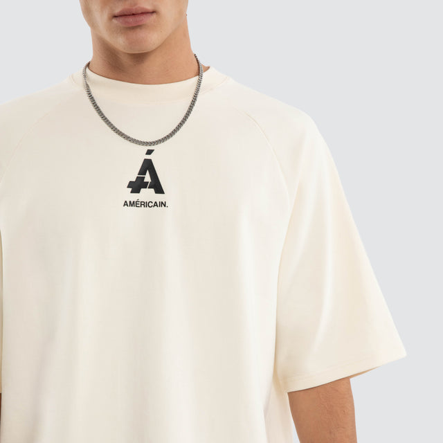 Model wears Glide Raglan Raptor Tee Tofu T-Shirts Cream – image 4