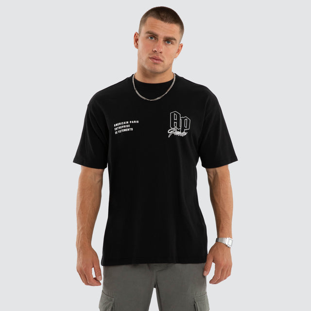 Model wears Eternia Box Fit Tee Jet Black T-Shirts Black – image 3