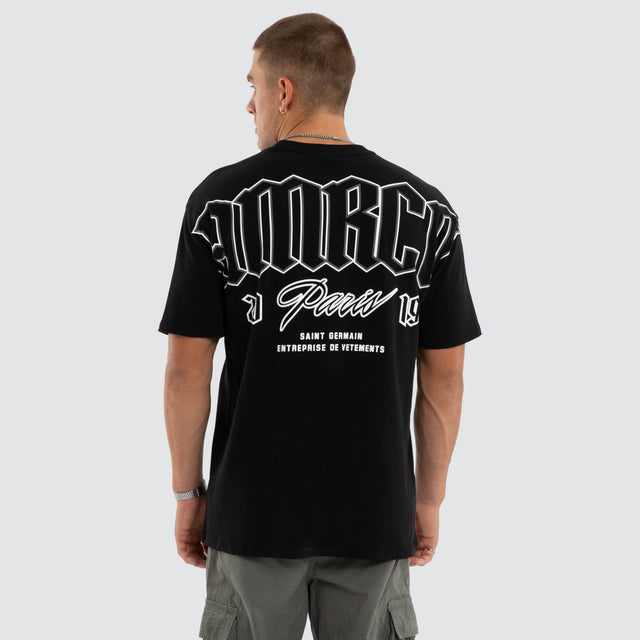 Model wears Eternia Box Fit Tee Jet Black T-Shirts Black – image 1