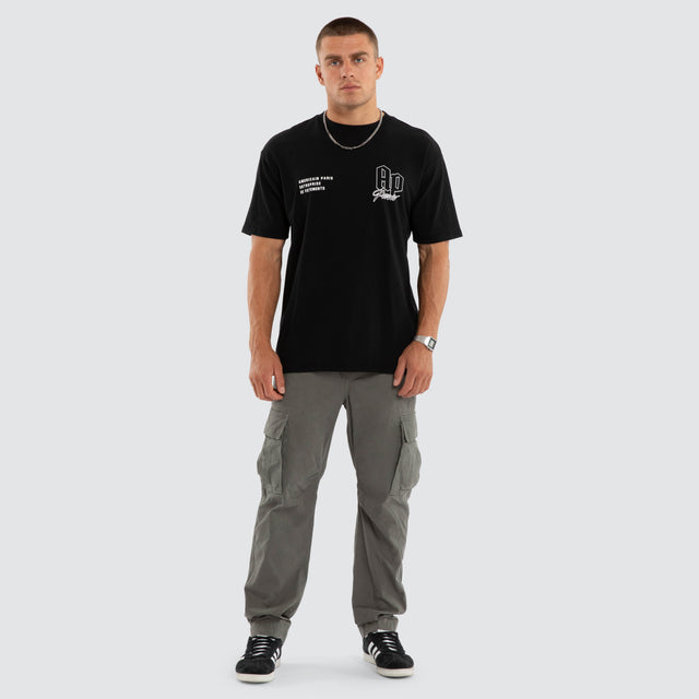 Model wears Eternia Box Fit Tee Jet Black T-Shirts Black – image 2