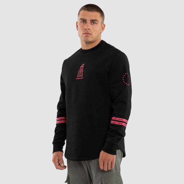 Model wears Sheild Dual Curved Sweater Jet Black Jumpers Black – image 4