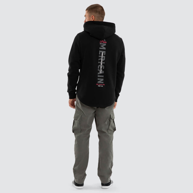 Model wears Saint Dual Curved Hoodie Jet Black Hoodies Black – image 2
