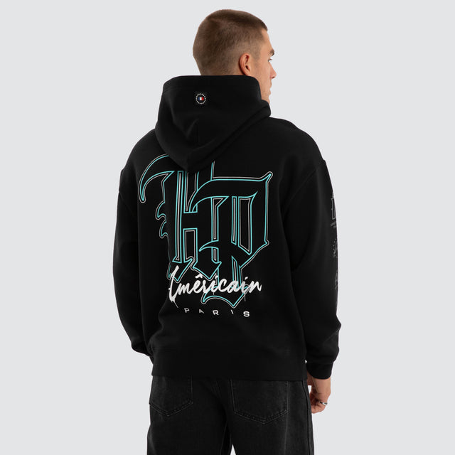 Model wears Vertigo Relaxed Hoodie Jet Black Hoodies Black – image 1