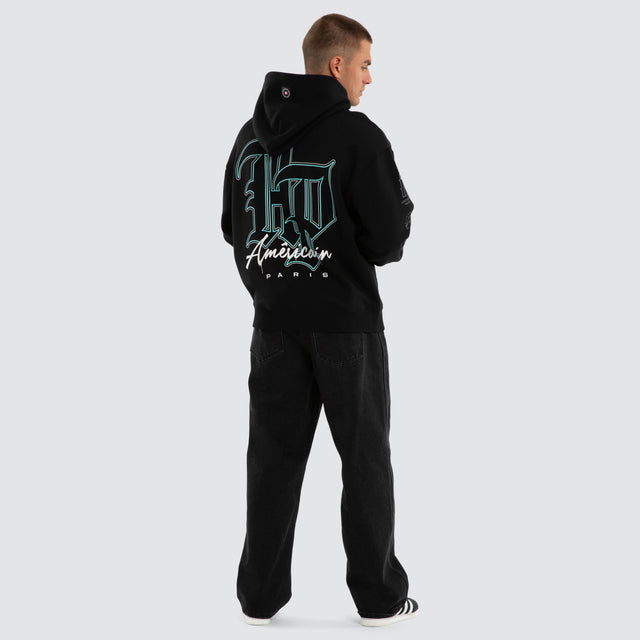 Model wears Vertigo Relaxed Hoodie Jet Black Hoodies Black – image 5