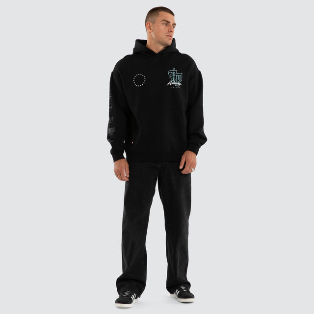 Model wears Vertigo Relaxed Hoodie Jet Black Hoodies Black – image 2