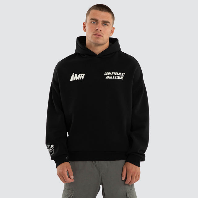 Model wears Department Athletic Hoodie Jet Black Hoodies Black – image 3
