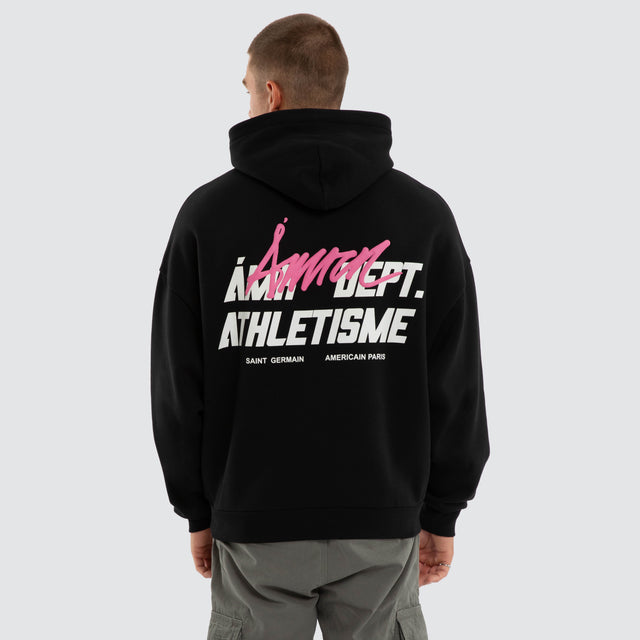 Model wears Department Athletic Hoodie Jet Black Hoodies Black – image 1