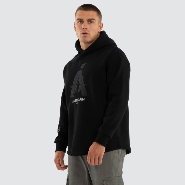 Model wears Motion Relax Dual Curve Hoodie Jet Black Hoodies Black – image 3