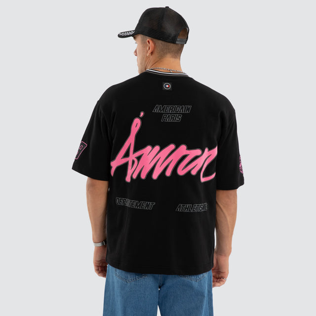 Model wears Neon Loopback Oversized Tee Jet Black T-Shirts Black – image 1