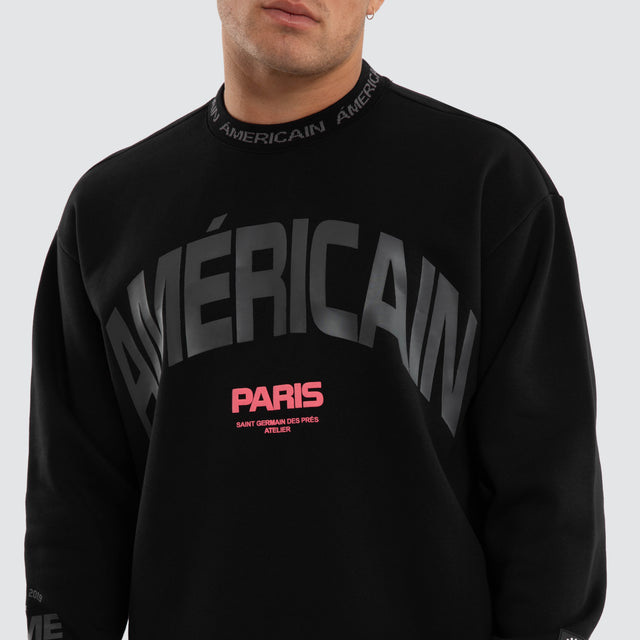 Model wears Flux Relaxed Sweater Jet Black Jumpers Black – image 4