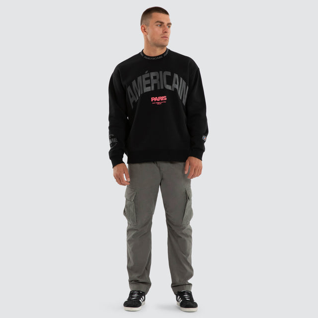 Model wears Flux Relaxed Sweater Jet Black Jumpers Black – image 5