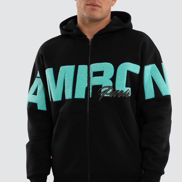 Model wears Halo Relaxed Zip Hoodie Jet Black Hoodies Black – image 4