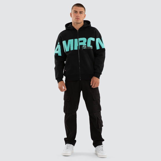 Model wears Halo Relaxed Zip Hoodie Jet Black Hoodies Black – image 5
