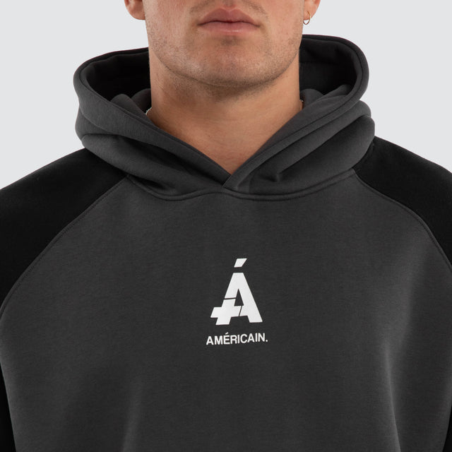 Model wears Axis Raglan Hoodie Asphalt/Anthracite Hoodies Black – image 4