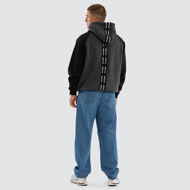 Model wears Axis Raglan Hoodie Asphalt/Anthracite Hoodies Black – image 5
