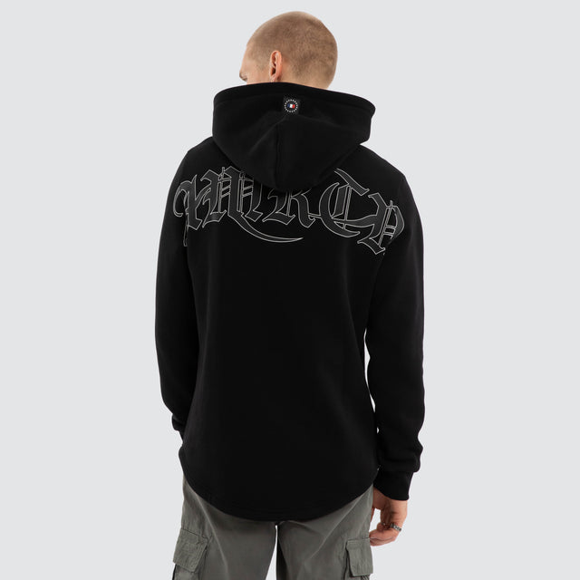 Model wears Crypt Dual Curved Hoodie Jet Black Hoodies Black – image 1