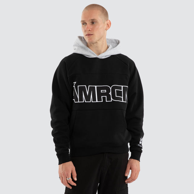 Model wears Blockade Raglan Hoodie Anthracite/Grey Marle Hoodies Black – image 1