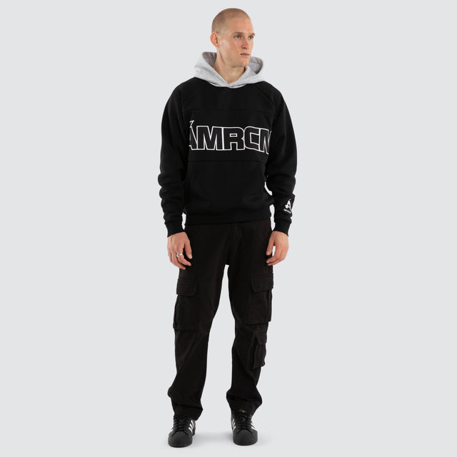 Model wears Blockade Raglan Hoodie Anthracite/Grey Marle Hoodies Black – image 5
