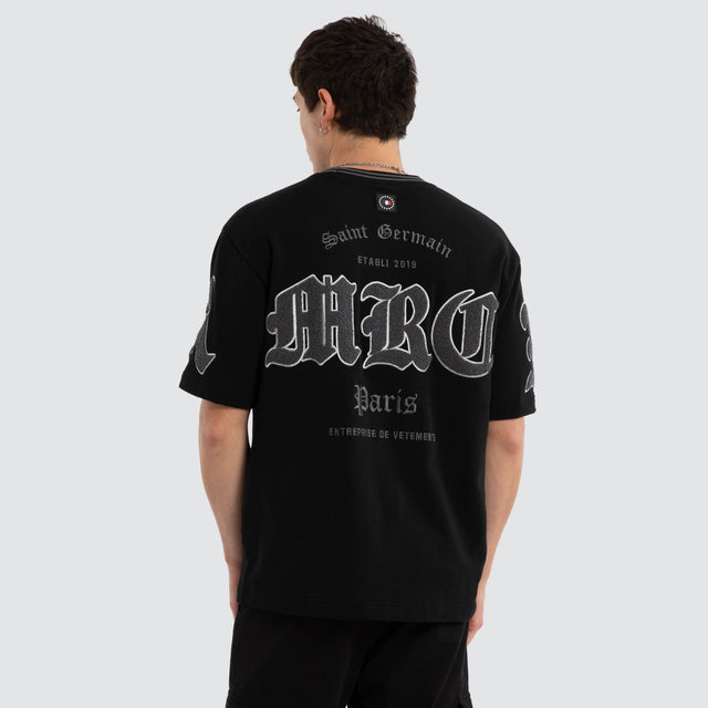Model wears Grind Loopback Oversized Tee Jet Black T-Shirts Black – image 3