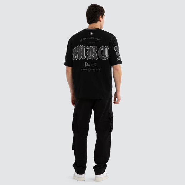 Model wears Grind Loopback Oversized Tee Jet Black T-Shirts Black – image 5