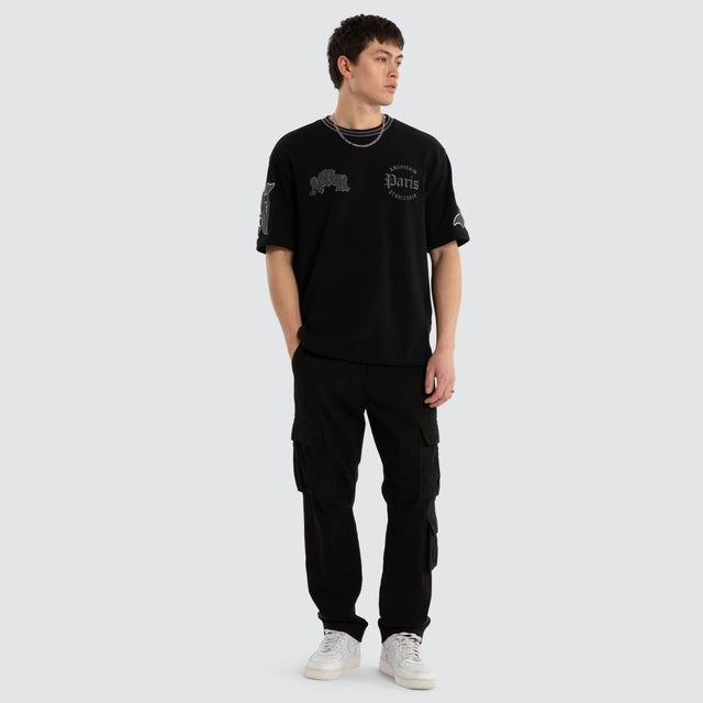 Model wears Grind Loopback Oversized Tee Jet Black T-Shirts Black – image 4