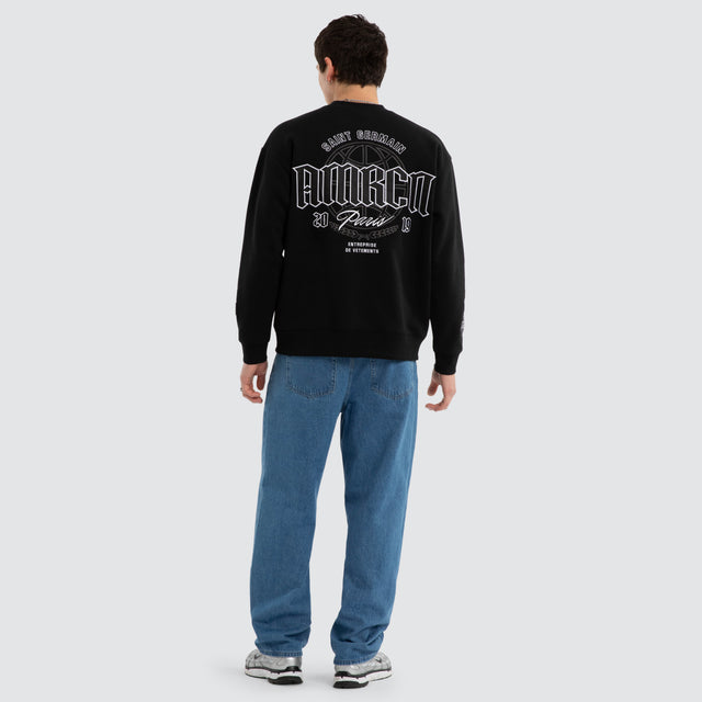 Model wears Grindstate Relaxed Sweater Jet Black Jumpers Black – image 5