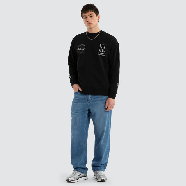 Model wears Grindstate Relaxed Sweater Jet Black Jumpers Black – image 4