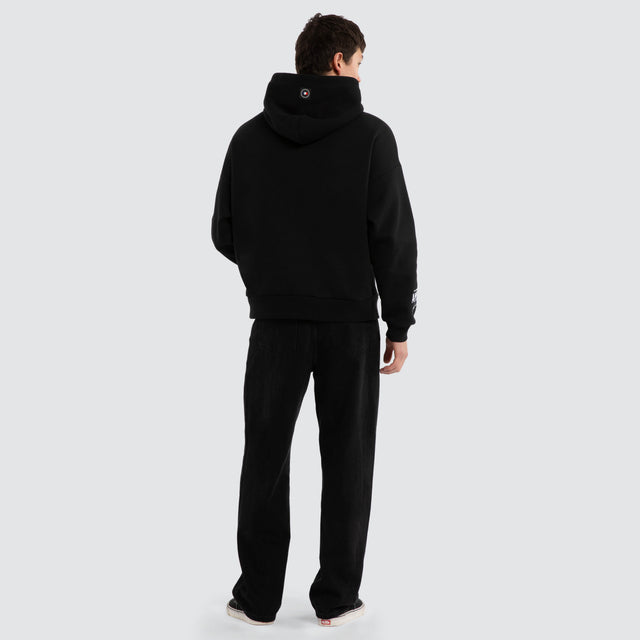Model wears Legend Relaxed Hoodie Jet Black/White Hoodies Black – image 5
