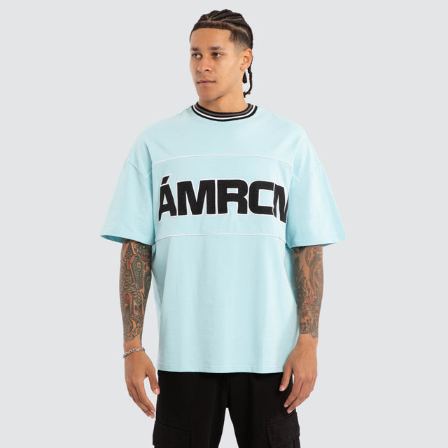 Model wears Blockade Winner Tee Aquaesque T-Shirts Blue – image 3