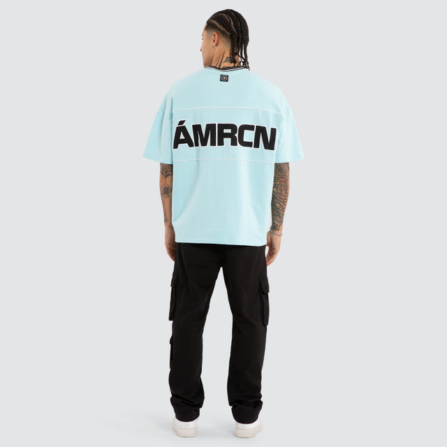 Model wears Blockade Winner Tee Aquaesque T-Shirts Blue – image 5