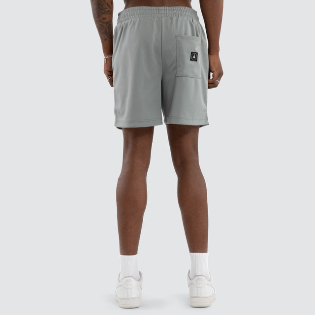 Model wears Shield Loopback Oversized Tee White T-Shirts White – image 4