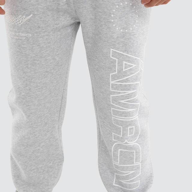 Model wears Origin Trackpant Grey Marle Trackpants Grey – image 5