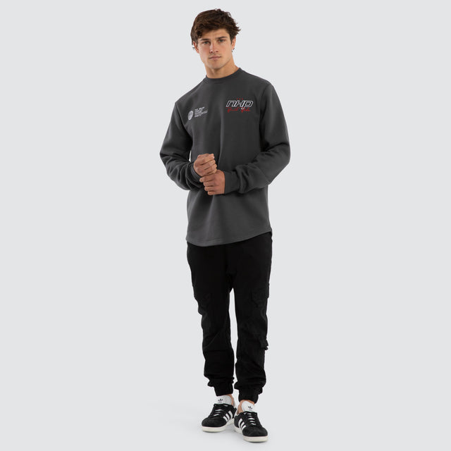 Model wears Moderate Dual Curved Sweater Asphalt Jumpers Grey – image 2