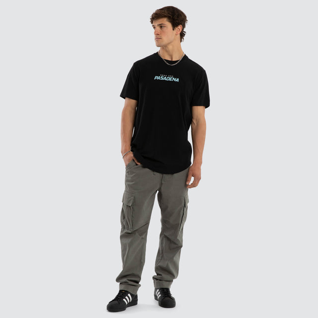 Model wears System Dual Curved Tee Jet Black T-Shirts Black – image 2