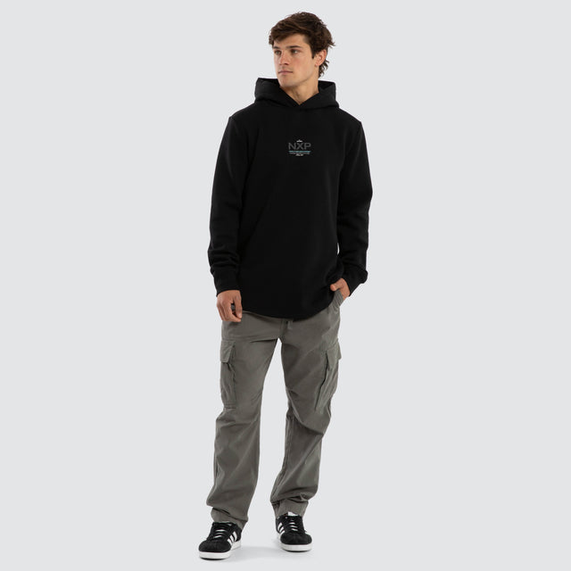 Model wears Peak Dual Curved Hoodie Jet Black Hoodies Black – image 2