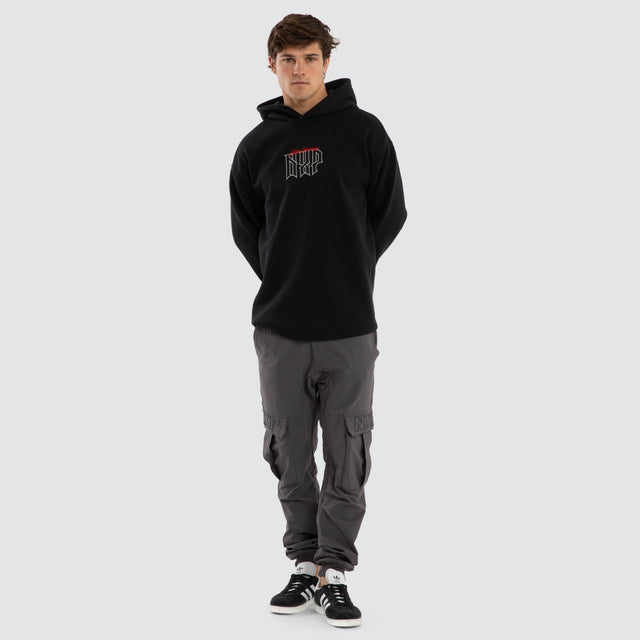 Model wears Motion Relax Dual Curve Hoodie Anthracite Black Hoodies Black – image 2