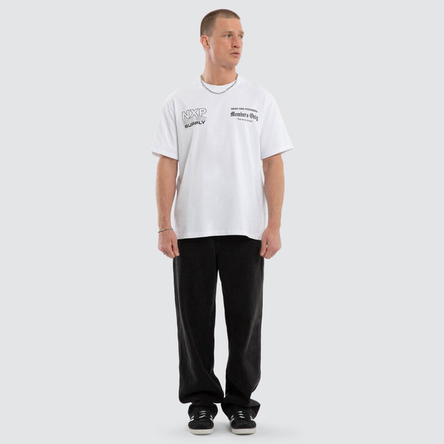 Model wears Dominant Classic Tee Optical White T-Shirts White – image 2
