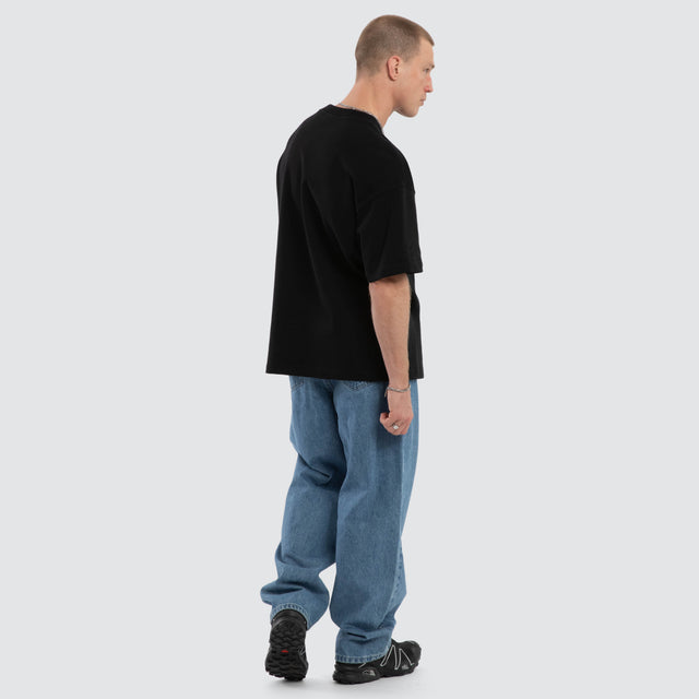Model wears Session Loopback Raptor Tee Jet Black T-Shirts Black – image 2
