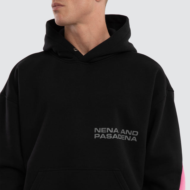 Model wears Zone Box Fit Hoodie Black/Pink Hoodies Black – image 5