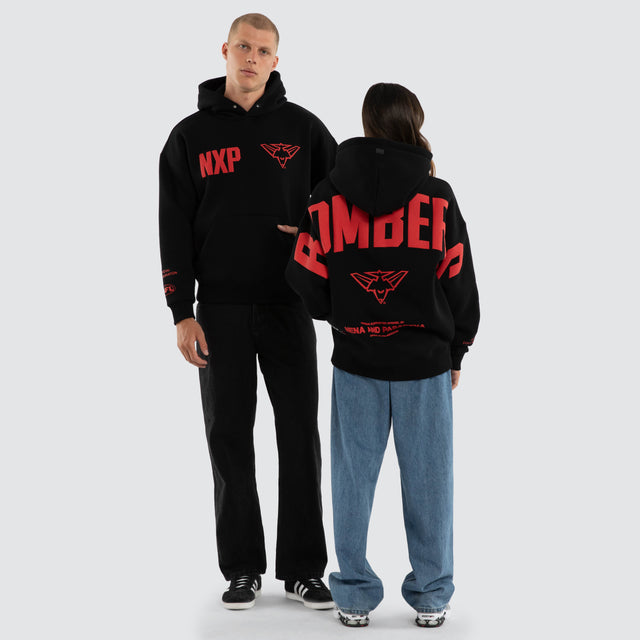 Model wears Essendon Bombers AFL Top Tier Hoodie Jet Black Hoodies Black – image 3