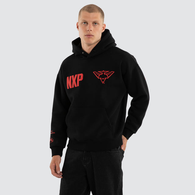Model wears Essendon Bombers AFL Top Tier Hoodie Jet Black Hoodies Black – image 4
