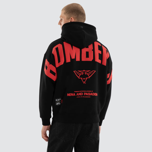 Model wears Essendon Bombers AFL Top Tier Hoodie Jet Black Hoodies Black – image 5