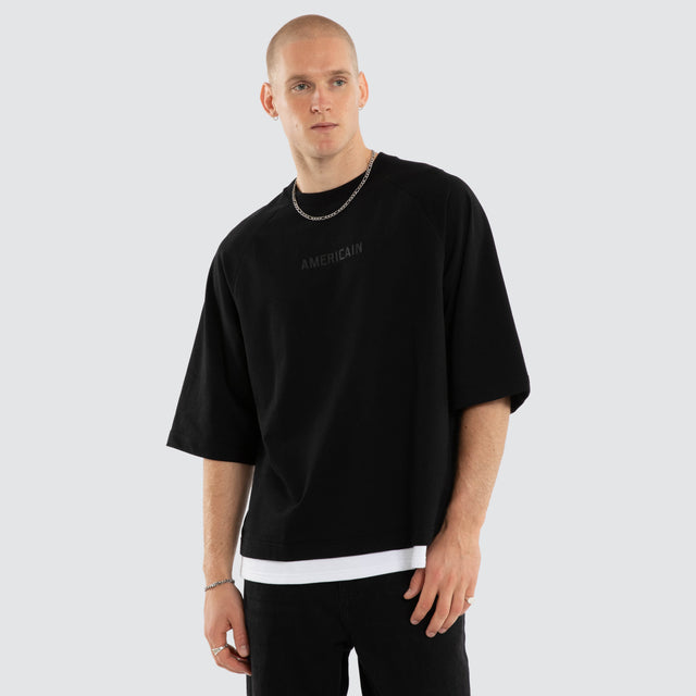 Model wears Strata Raglan Raptor Tee Jet Black/White T-Shirts Black – image 1