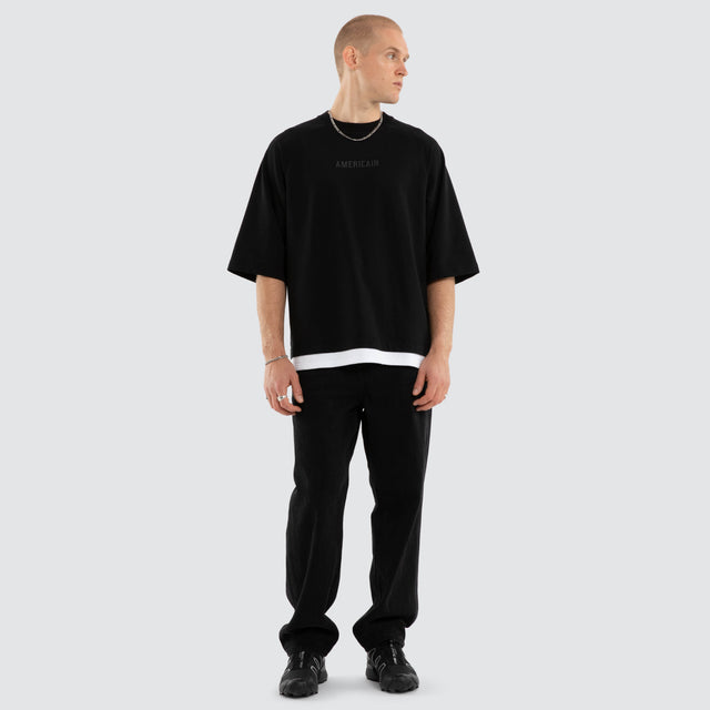 Model wears Strata Raglan Raptor Tee Jet Black/White T-Shirts Black – image 5